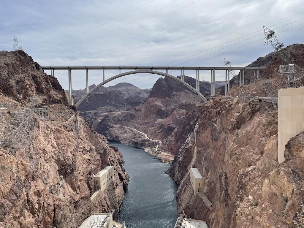 Upper bridge at the Hoover Dam with electric towers and power lines