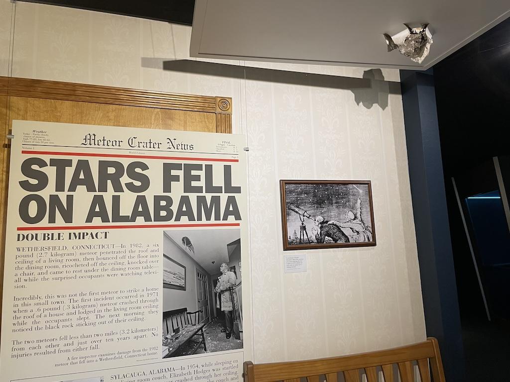 Exhibit Luna saw at Meteor Crater Discovery Center with meteor through someone’s roof