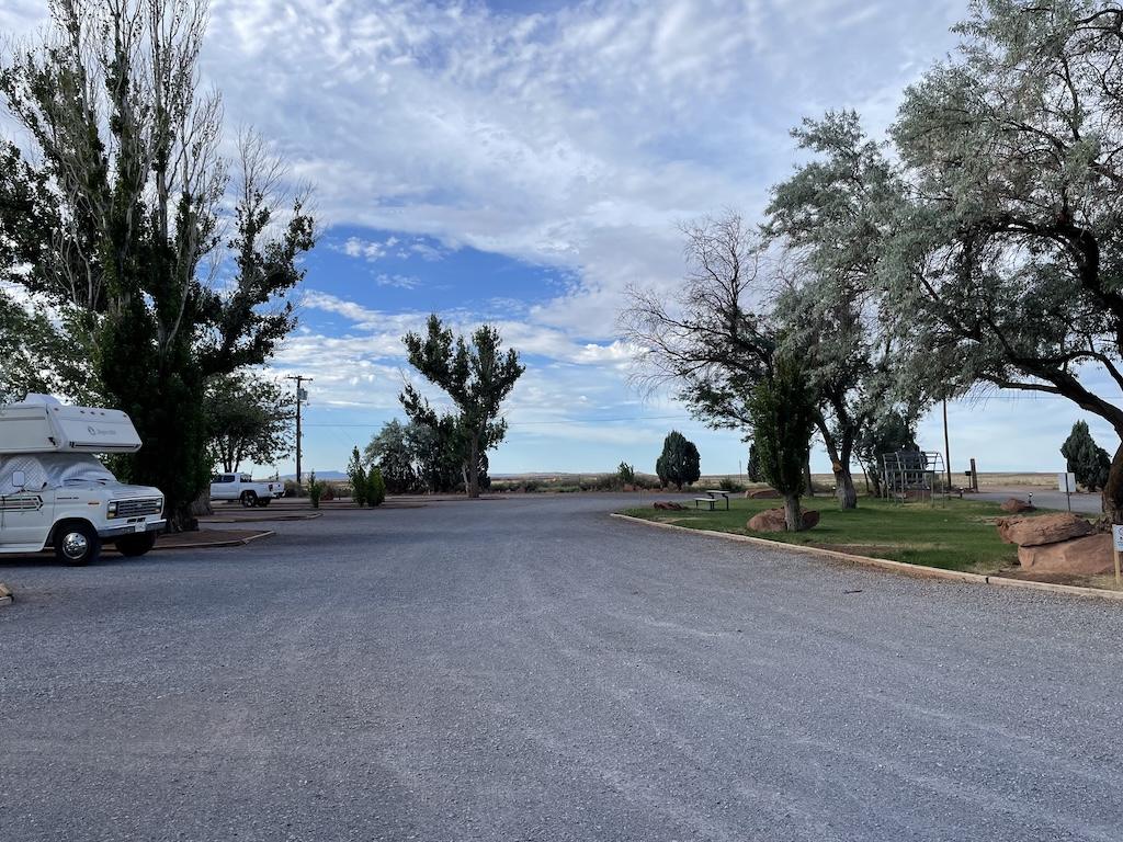 View of front part of RV and gravel road at Meteor Crater RV park in Winslow, Arizona