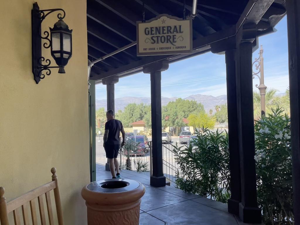 A man is about to enter The Ranch at Death Valley General Store in California