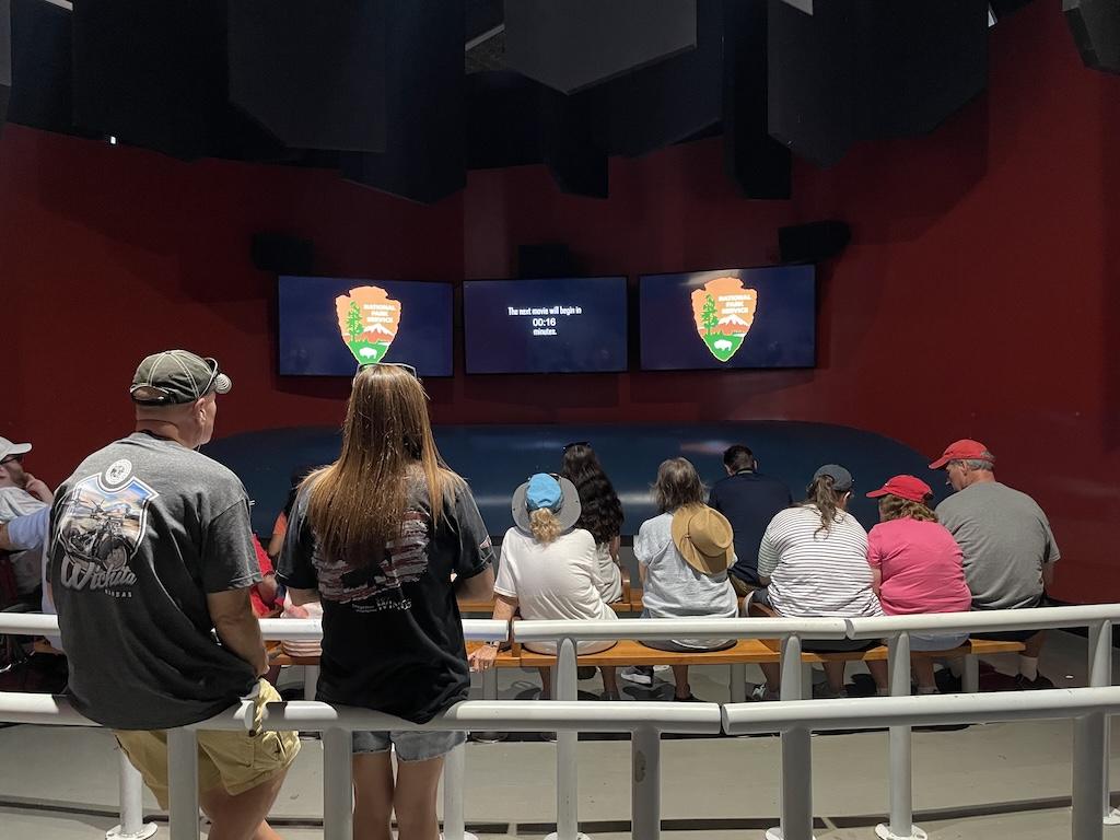 People in the theater waiting for the documentary to start at Pearl Harbor National Memorial in Oahu, Hawaii
