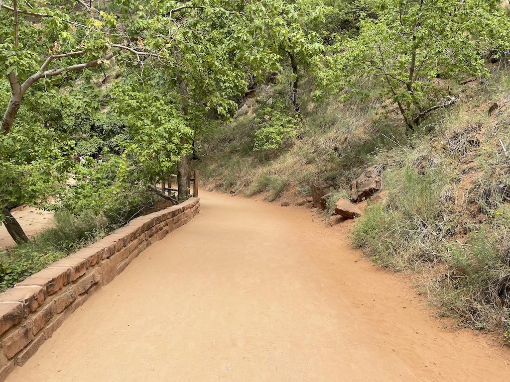 View of the sandy trail on the Riverside Walk at Zion National Park in Utah