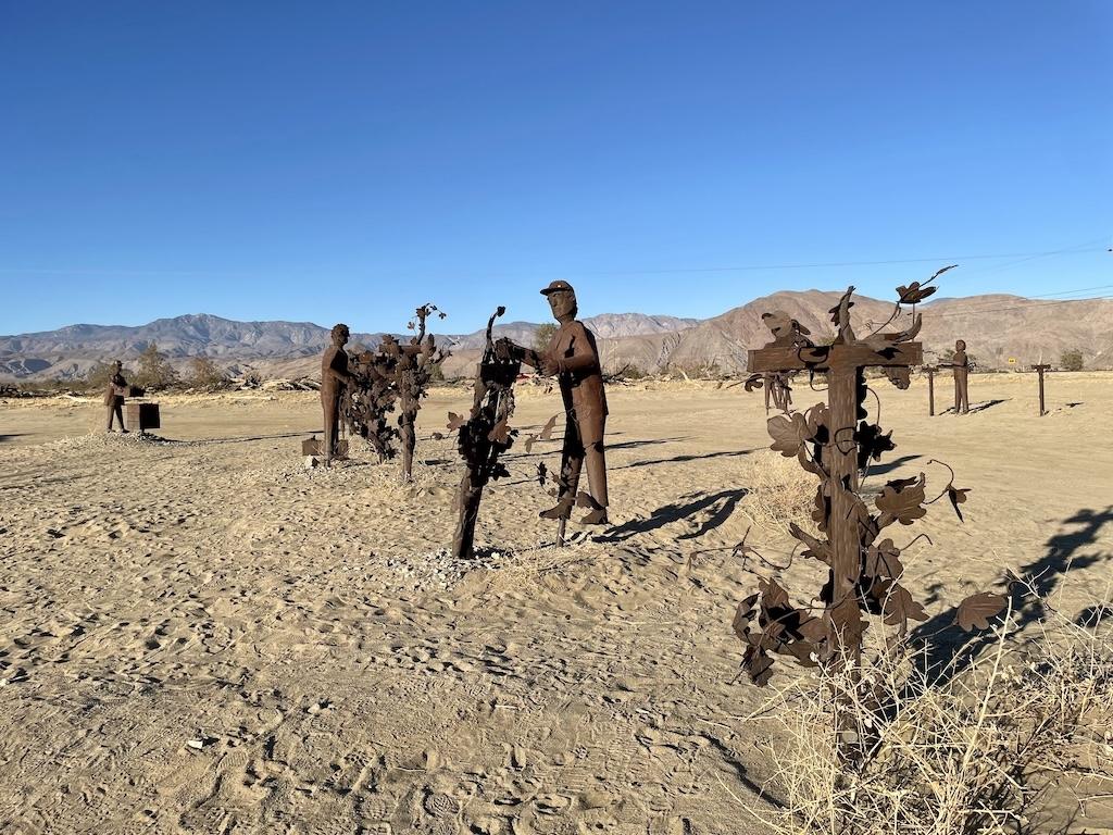 Farm workers picking grapes sculptures at Galleta Meadows in Anza-Borrego, California