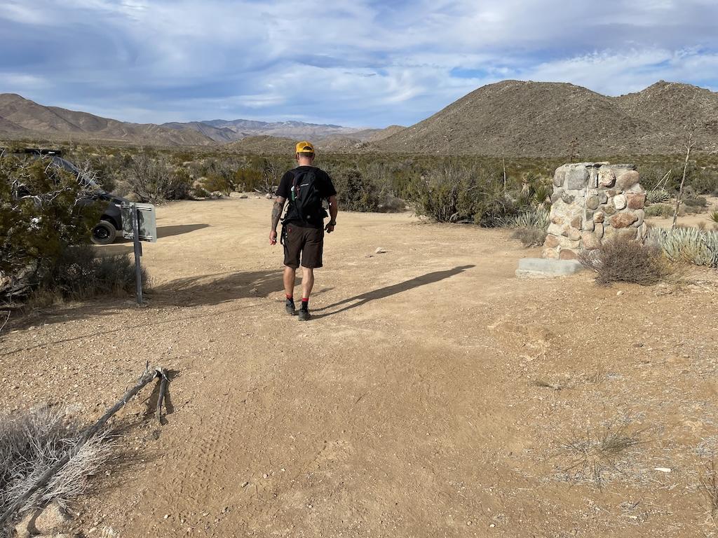 Man walking back to the trailhead at Ghost Mountain in Anza-Borrego Desert State Park, California