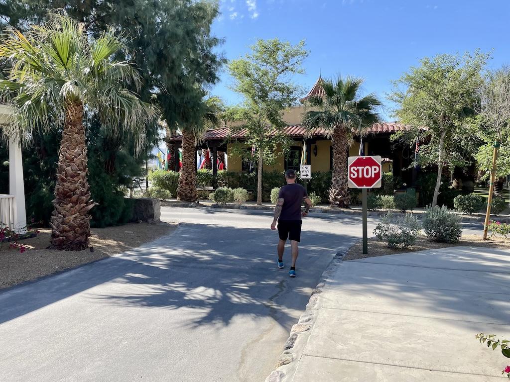View of man walking the streets near the Town Hall at the Ranch at Death Valley, in California