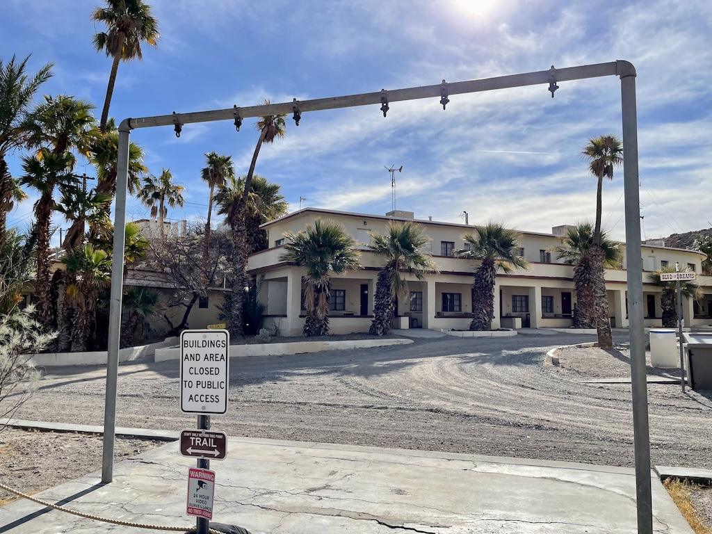 View of buildings and sign that says they are closed at Soda Springs, California
