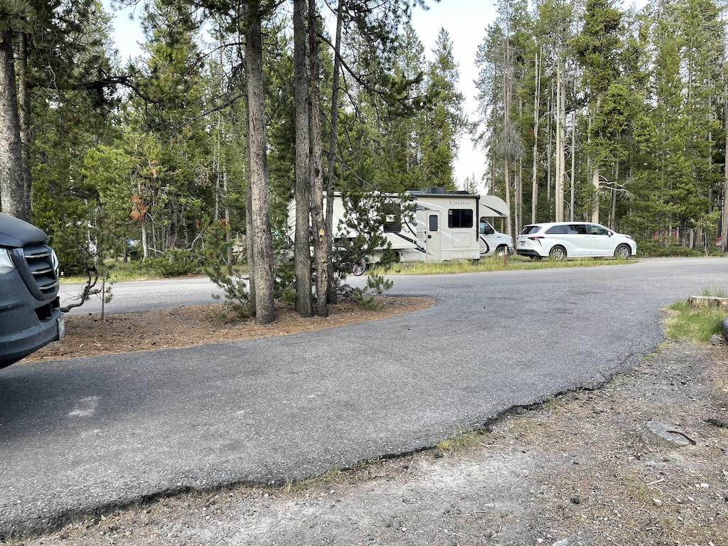 RV and car at Madison Campground in Yellowstone National Park, Wyoming