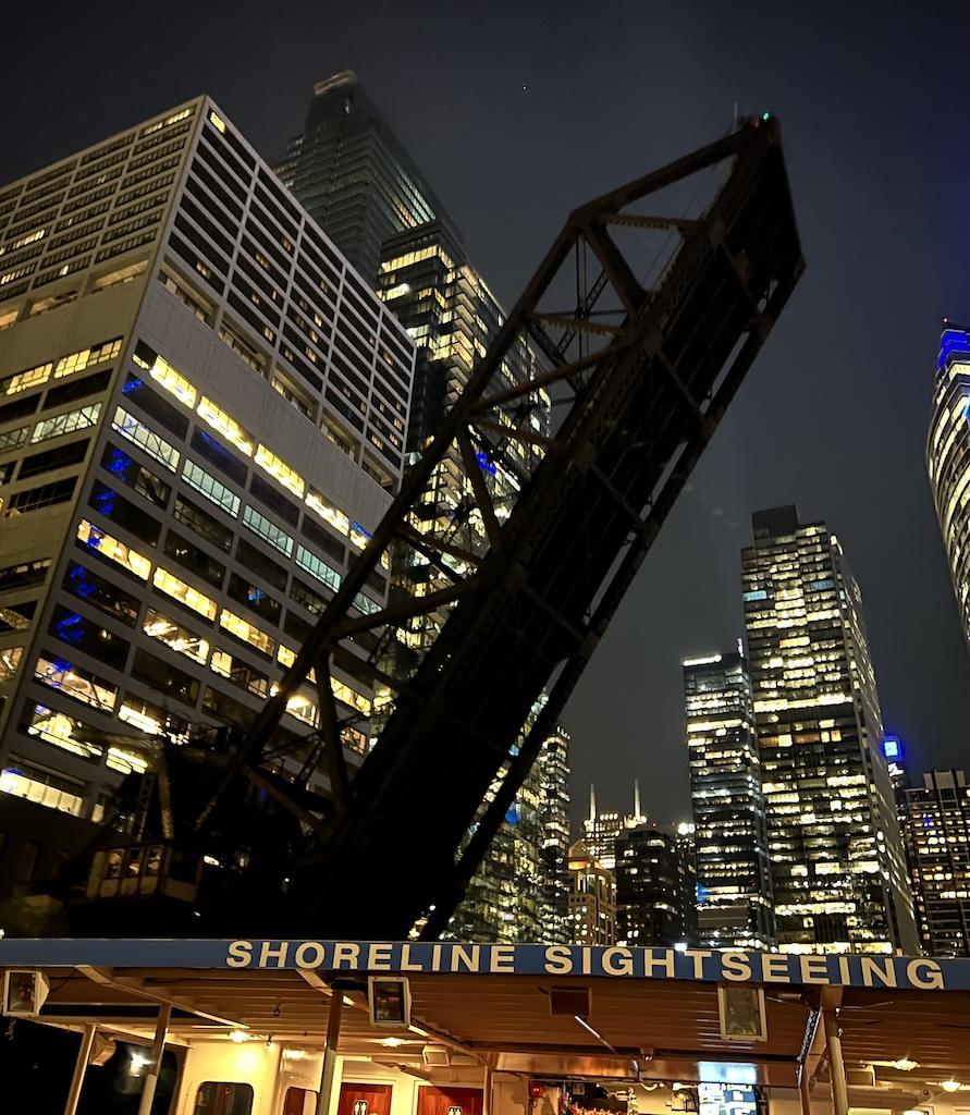 View of bridge going up at night on the Chicago architecture river with Shoreline Sightseeing in Illinois