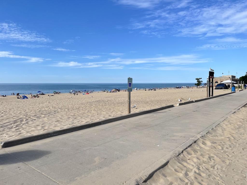 View of boardwalk and people at the beach in distance at Indiana Dunes State Park