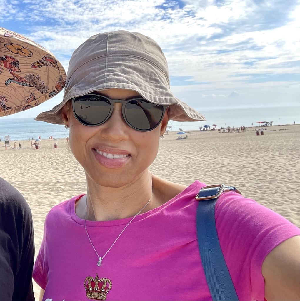 Luna smiling to the camera at the beach at Indiana Dunes State Park