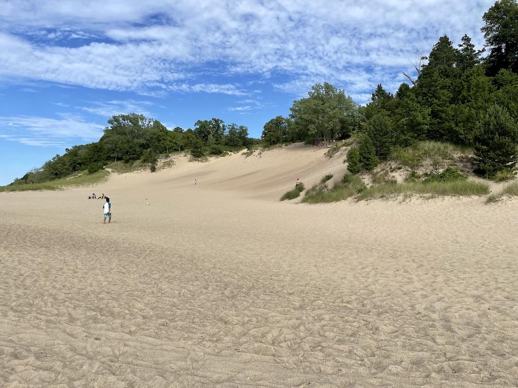 View of people running up Devil’s Slide in the distance at Indiana Dunes State Park