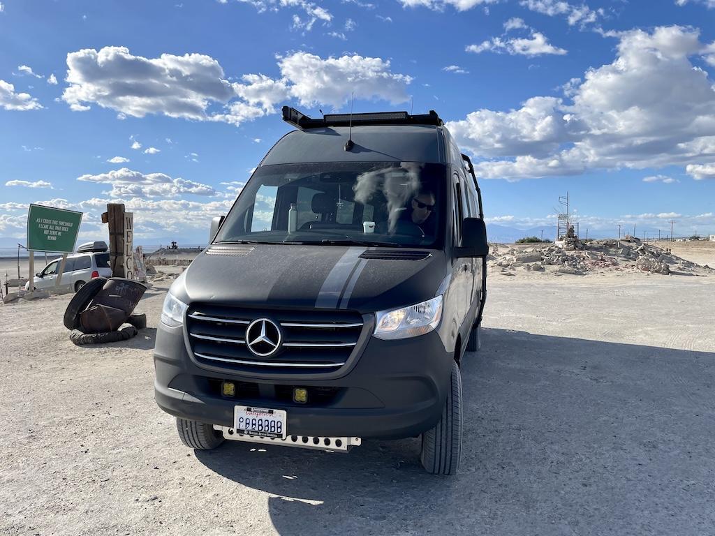 Front view of Luna’s Sprinter van at Bombay Beach in California