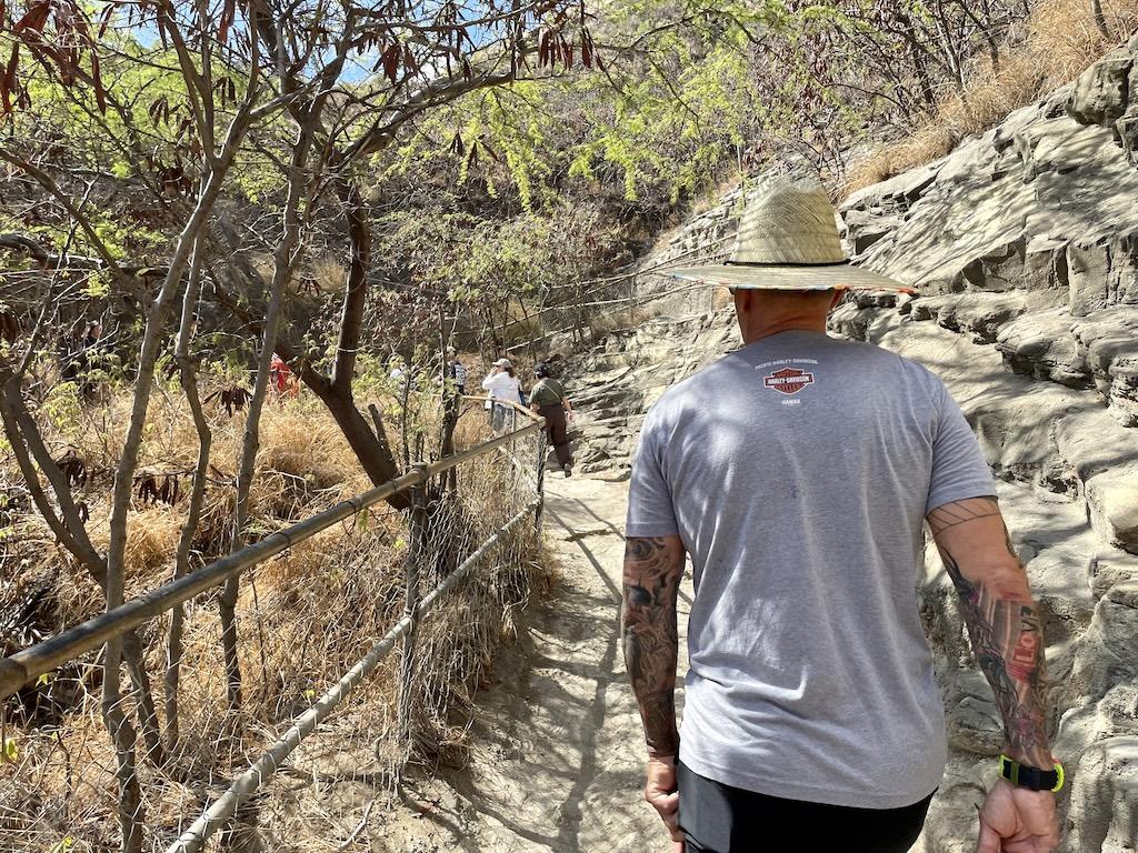 View of man hiking Diamond Head Crater in Oahu, Hawaii