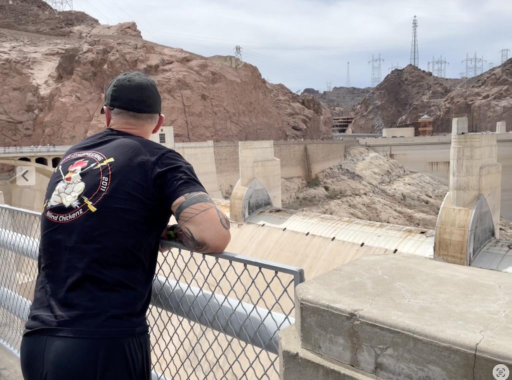Man looking at spillways at the Hoover Dam in Nevada