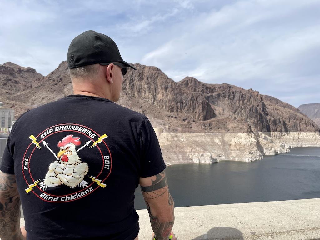 Man looking at Colorado River at Hoover Dam in Neveda