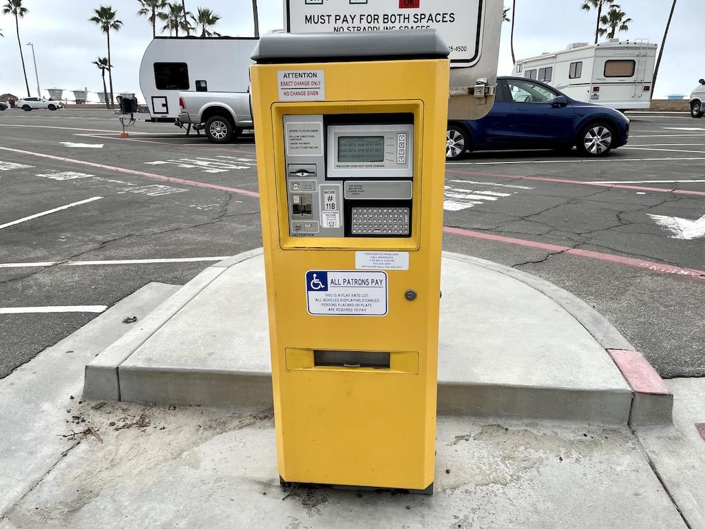 View of parking meter in the overnight parking lot in Oceanside Harbor, California