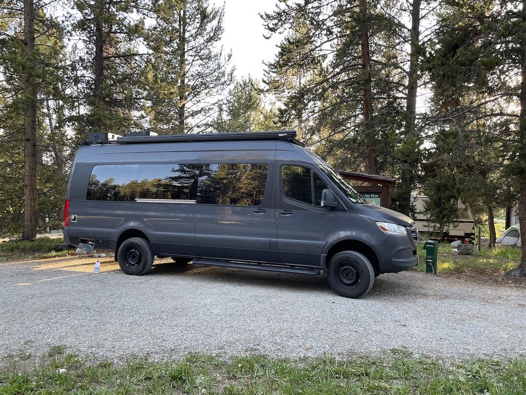 Side view of Luna’s camper van at Lakeview Bighorn Campground, near Meadowlark Lake in Wyoming