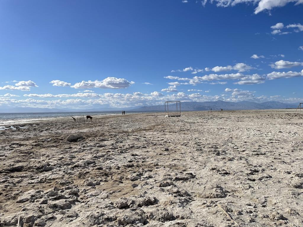 View of artwork at distance by Salton Sea at Bombay Beach, California