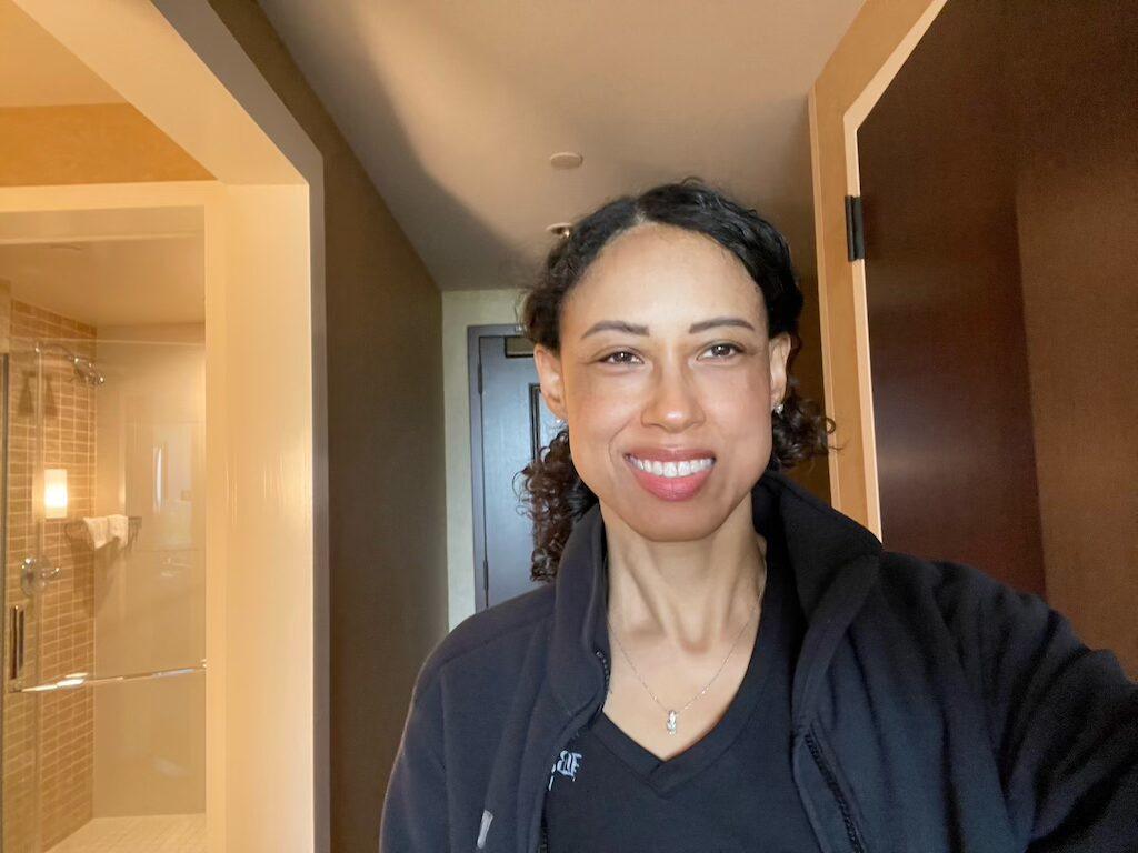 Luna smiling in hotel room at the Four Winds Casino Hotel in South Bend, Indiana