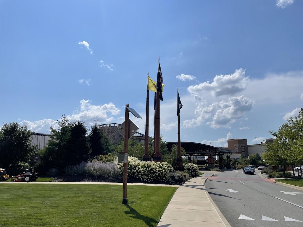 View of flags and flowers outside Four Winds Casino South Bend, Indiana