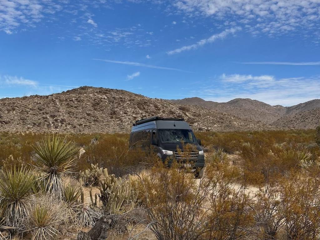 View of Sprinter Van driving off road to Ghost Mountain in Anza-Borrego Desert State Park, California