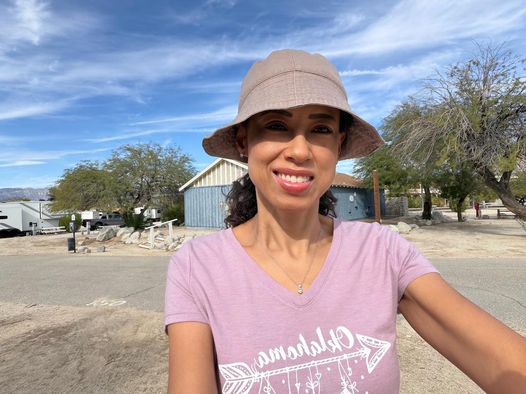 Luna smiling to the camera at Palm Canyon Hotel and RV Resort, Anza-Borrego Desert, California