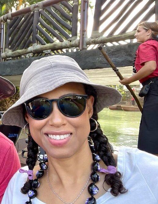 Luna smiling in canoe tour at the Polynesian Cultural Center in Oahu, Hawaii