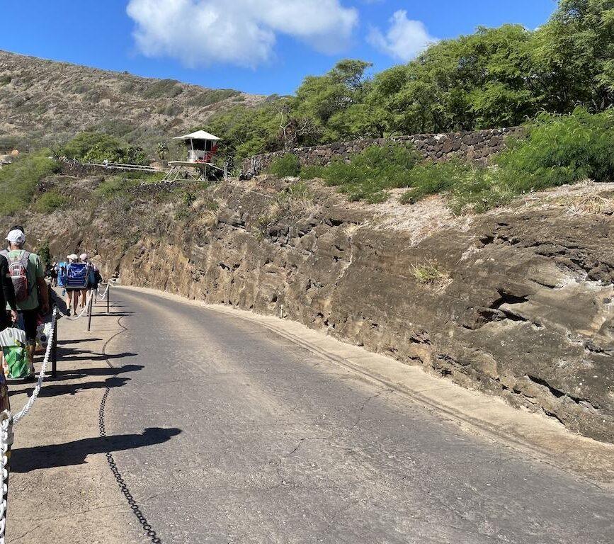 People walking down to the lower level to the bay at Hanauma Bay Nature Preserve in Ohau, Hawaii